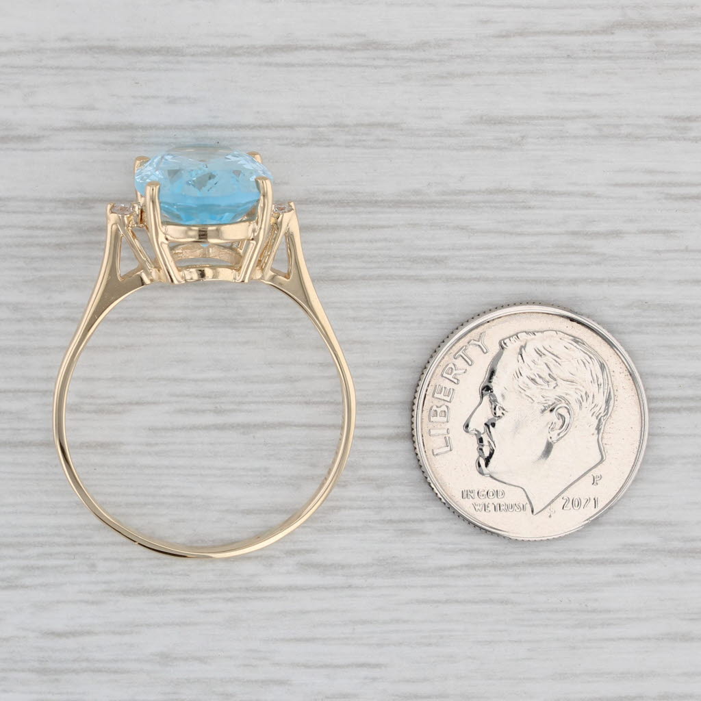 Light Gray 7.04ctw Oval Blue Topaz Diamond Ring 14k Yellow Gold Size 11.25