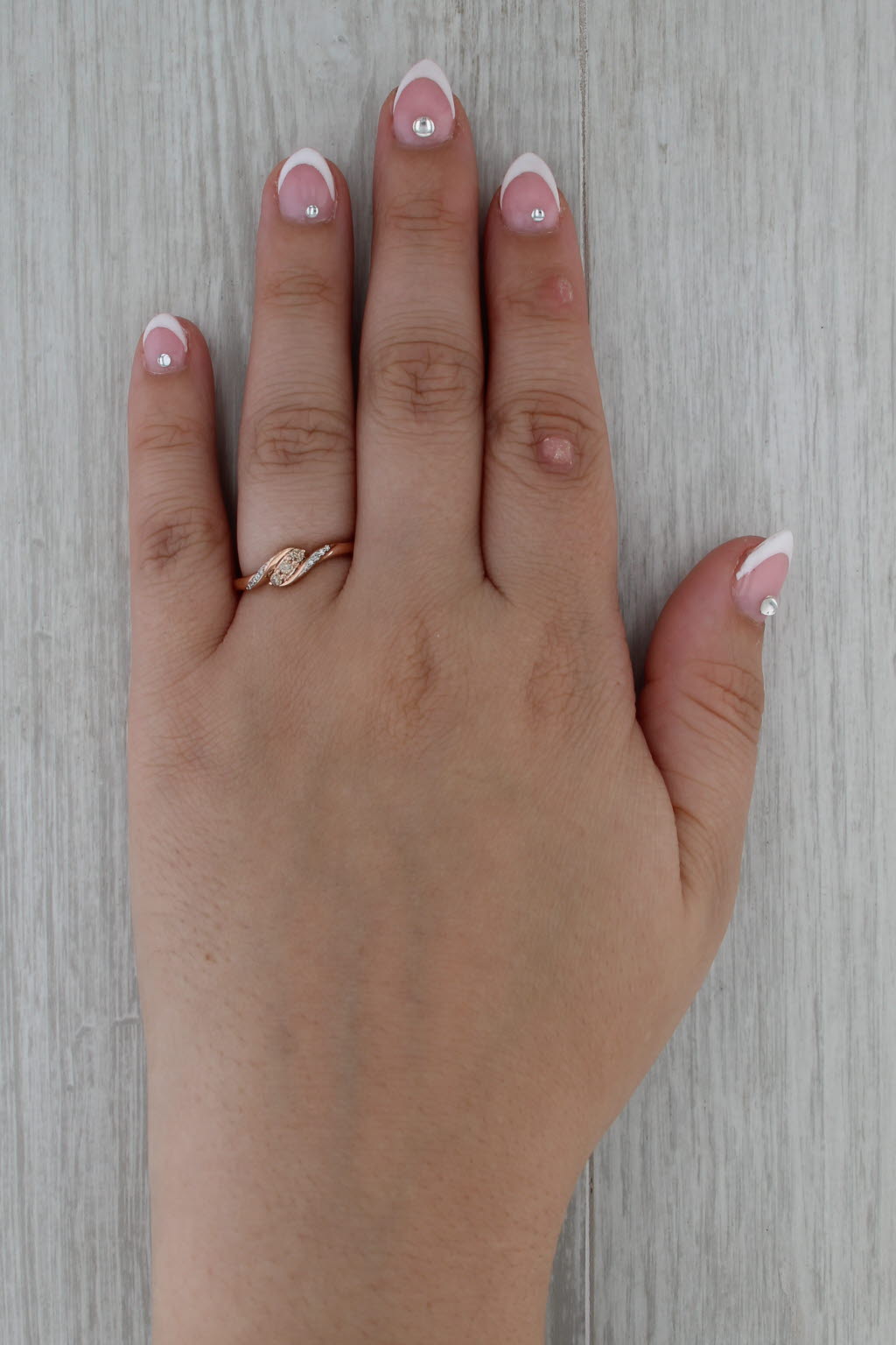 0.12ctw Diamond Bypass Ring 10k Rose Gold Size 6.75 Stackable