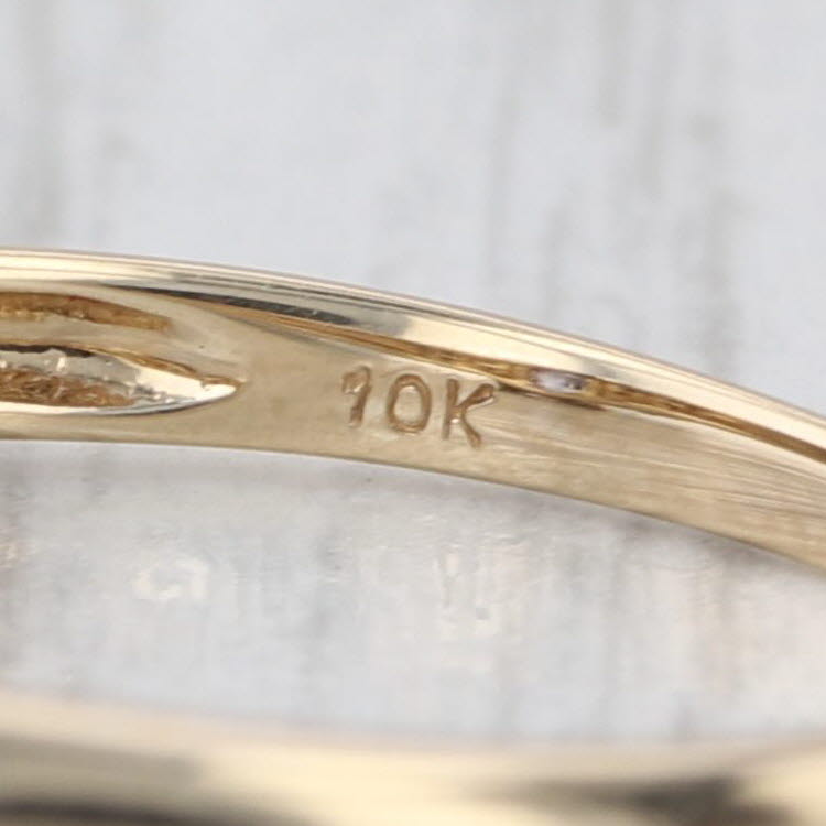 0.45ctw Color Change Garnet Diamond Ring 10k Yellow Gold Heart Accents