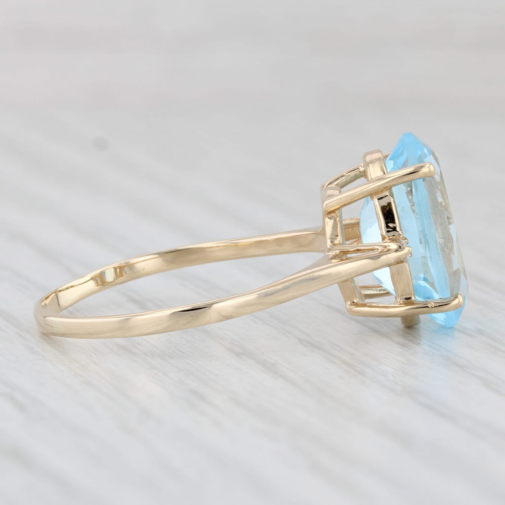 Light Gray 7.04ctw Oval Blue Topaz Diamond Ring 14k Yellow Gold Size 11.25