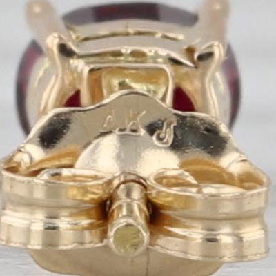 0.54ctw Lab Grown Ruby Stud Earrings 14k Yellow Gold Oval Solitaire Studs