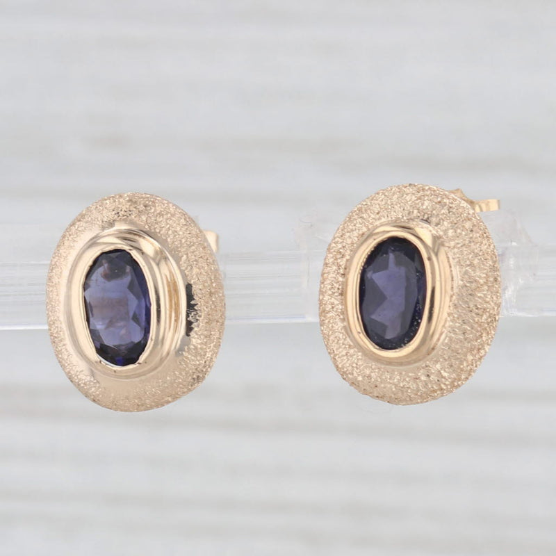 0.75ctw Oval Blue Iolite Stud Earrings 14k Yellow Gold