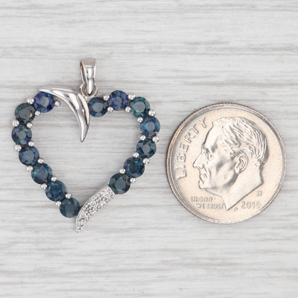 Light Gray 2.105ctw Blue Sapphire Open Heart Pendant Diamond Accents 14k White Gold