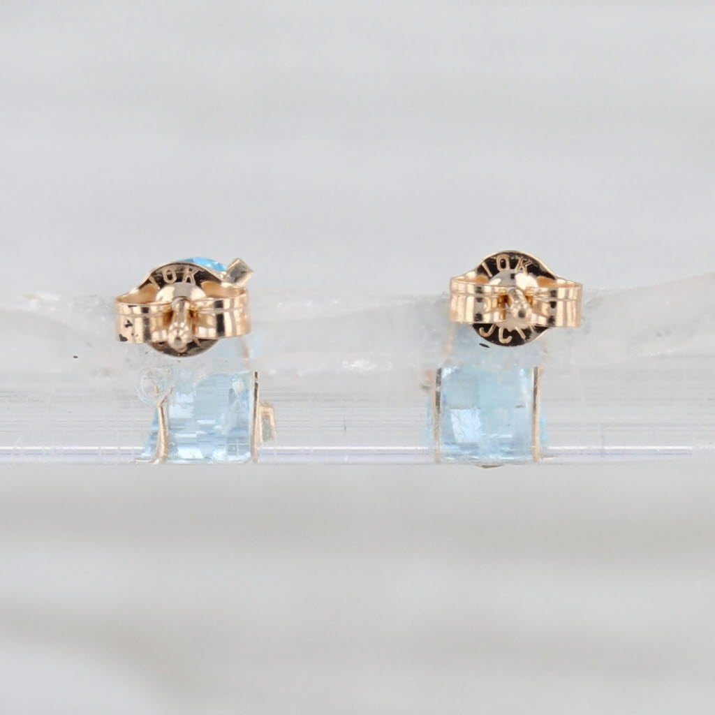 1.10ctw Oval Blue Topaz Stud Earrings 10k Yellow Gold Solitaire Studs