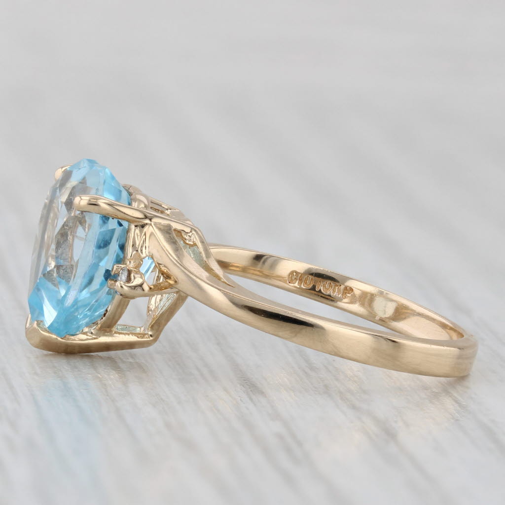 Light Gray 5.03ctw Blue Topaz Heart Ring 10k Yellow Gold Size 7 Diamond Accents