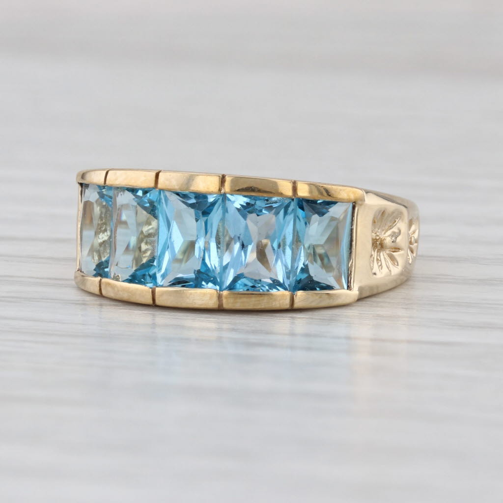 3.39ctw 5-Stone Blue Topaz Ring 10k Yellow Gold Size 7 Floral Accents