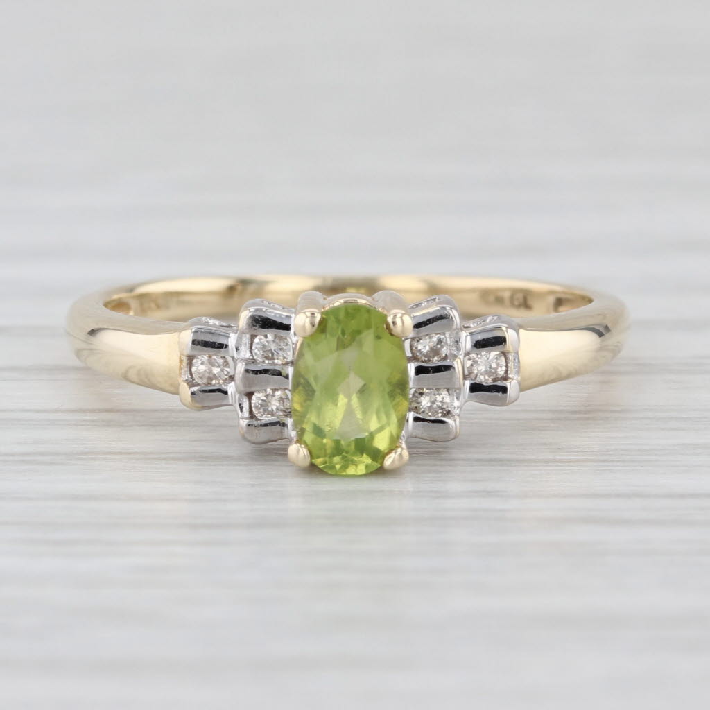 0.58ctw Oval Peridot Diamond Ring 10k Yellow Gold Size 7.25