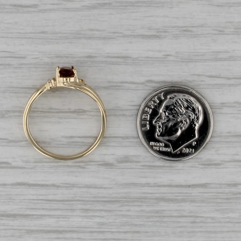 0.50ctw Garnet Cubic Zirconia Ring 10k Yellow Gold Size 6.25 Oval Bypass