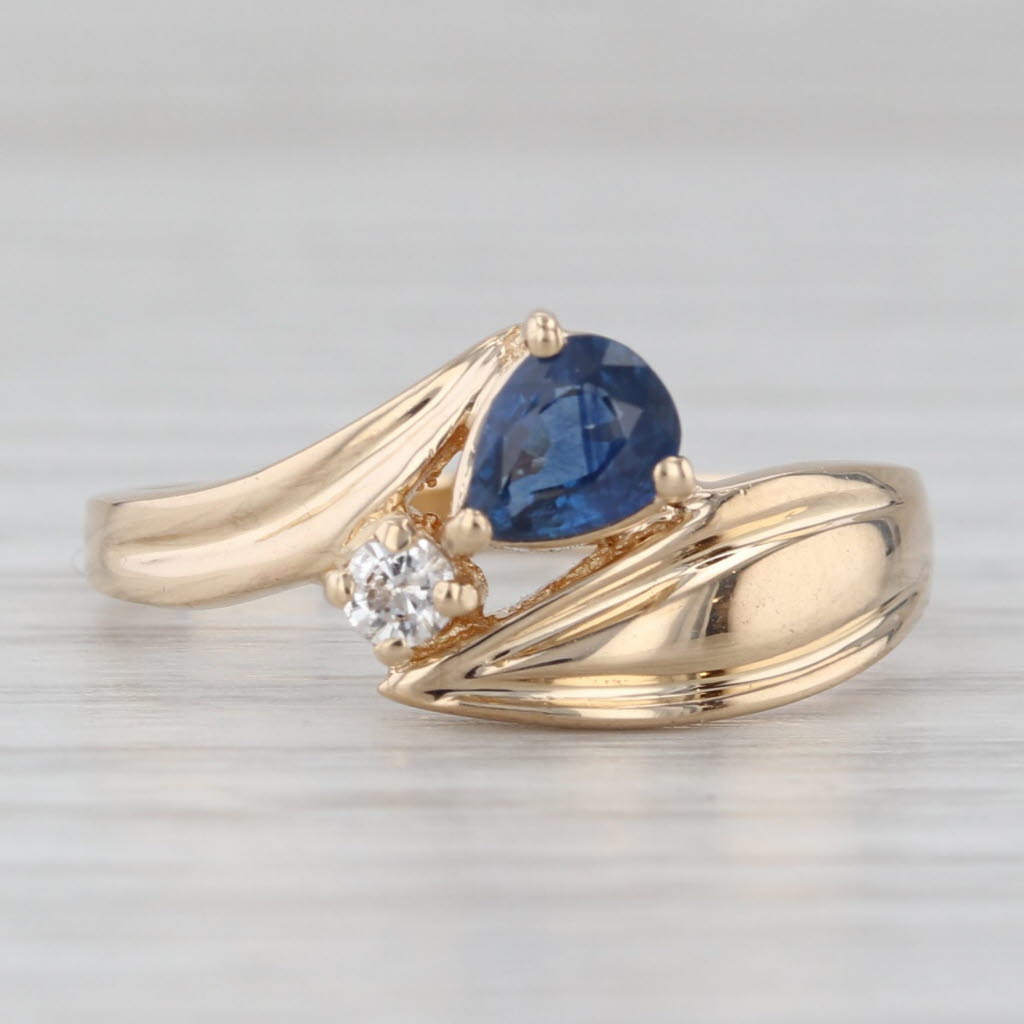 Light Gray 0.46ctw Pear Blue Diamond Bypass Ring 14k Yellow Gold Size 7.75