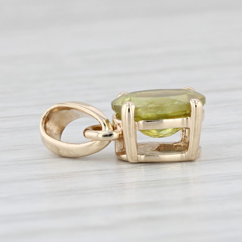 Light Gray 1.25ct Green Sphene Pendant 10k Yellow Gold Small Oval Solitaire Drop