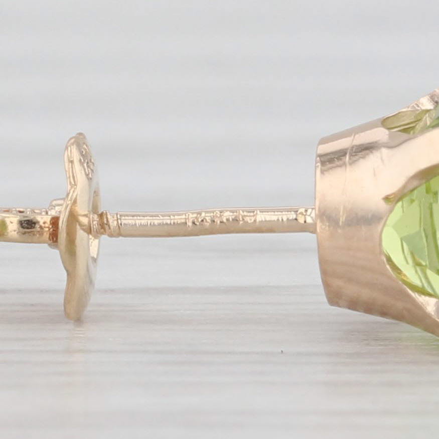 Light Gray 2.80ctw Green Peridot Stud Earrings 14k Yellow Gold Round Solitaires