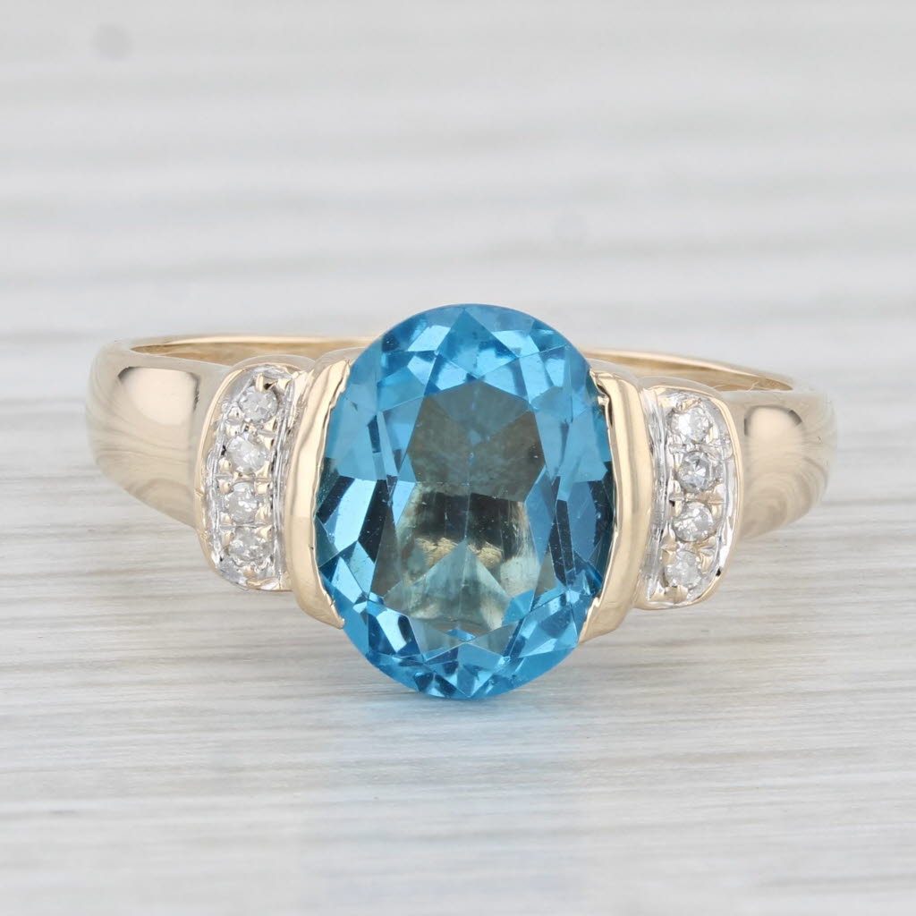 Light Gray 3.40ctw Oval Blue Topaz Diamond Ring 14k Yellow Gold Size 7.25