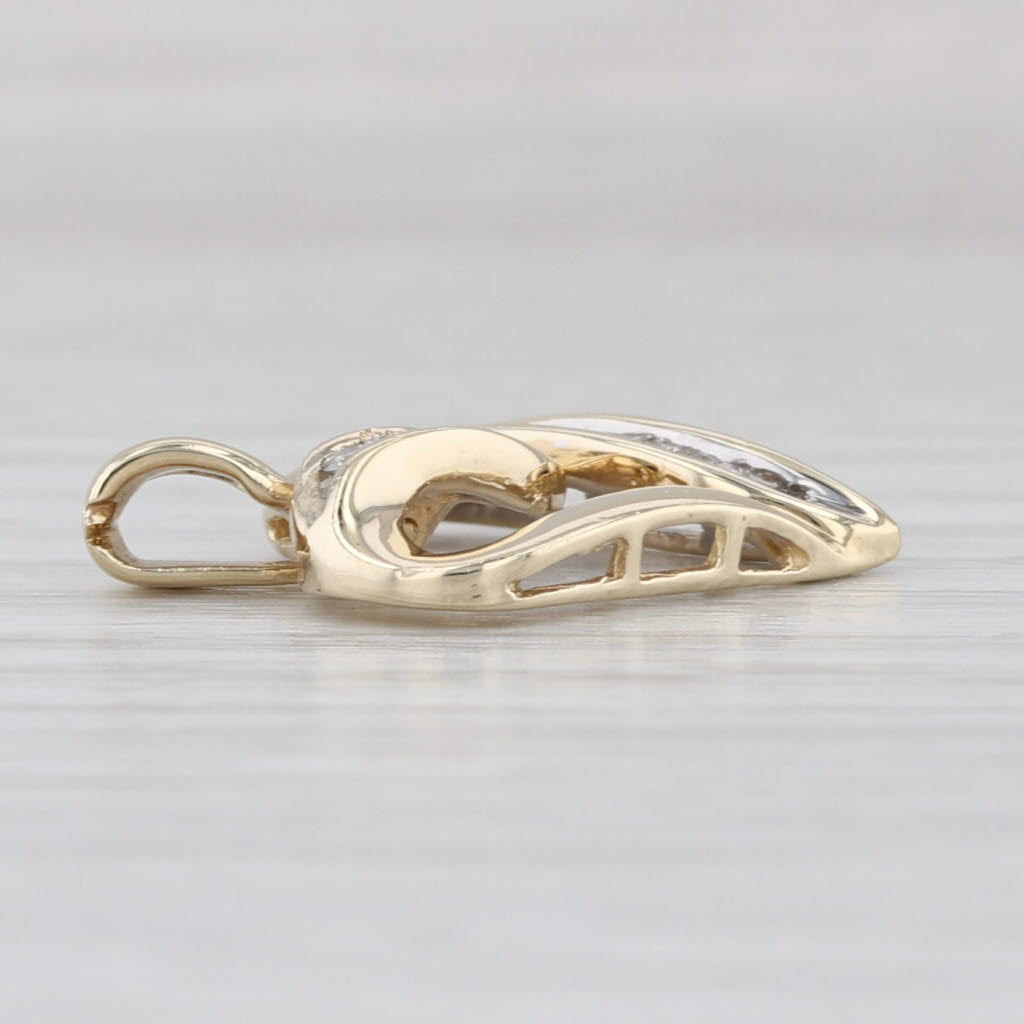 0.19ctw Diamond Open Heart Pendant 10k Yellow Gold Round & Baguette