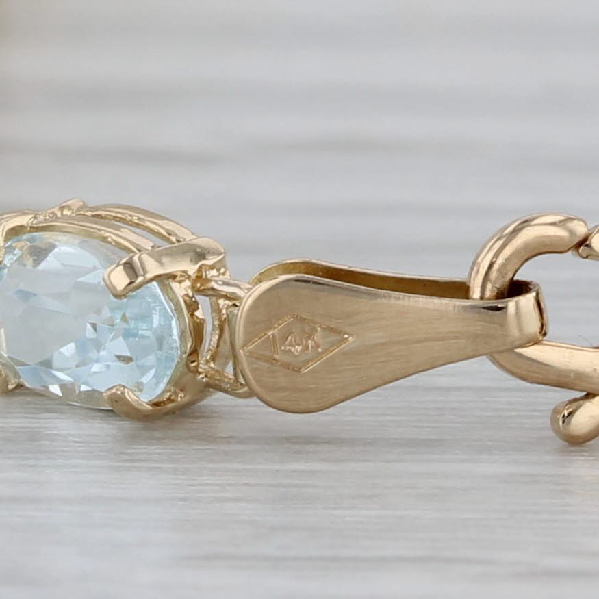 Gray 6.80ctw Oval Aquamarine Floral Tennis Bracelet 14k Yellow Gold 7" 4.2mm