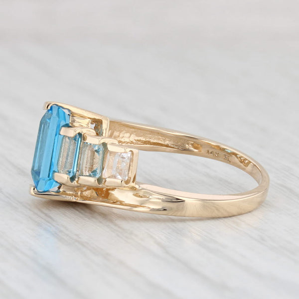 Light Gray 4.30ctw Blue White Tiered Topaz Ring 14k Yellow Gold Size 7