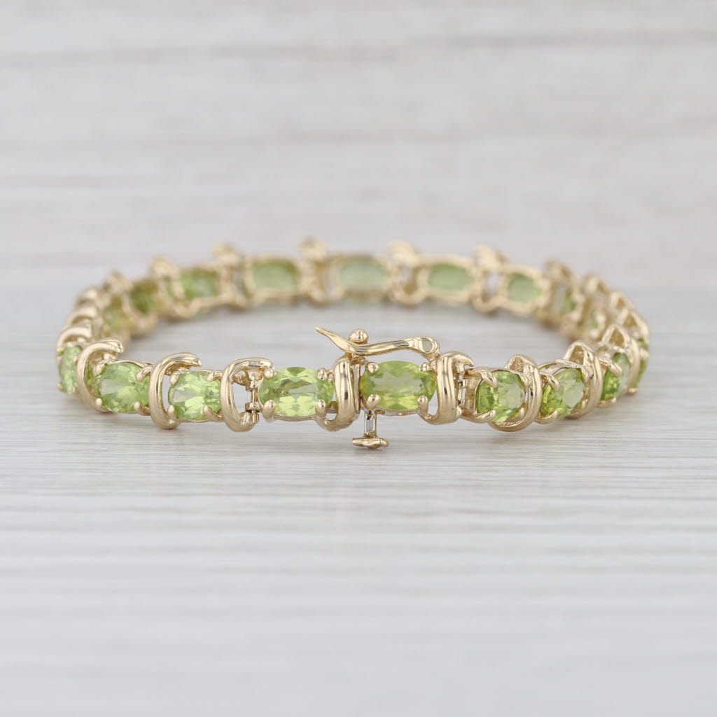 10ctw Light Green Peridot Tennis Bracelet 14k Yellow Gold 6.75" 6.4mm
