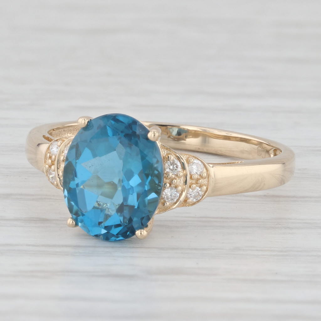 Light Gray 3.33ctw Oval London Blue Topaz Diamond Ring 14k Yellow Gold Size 9.25