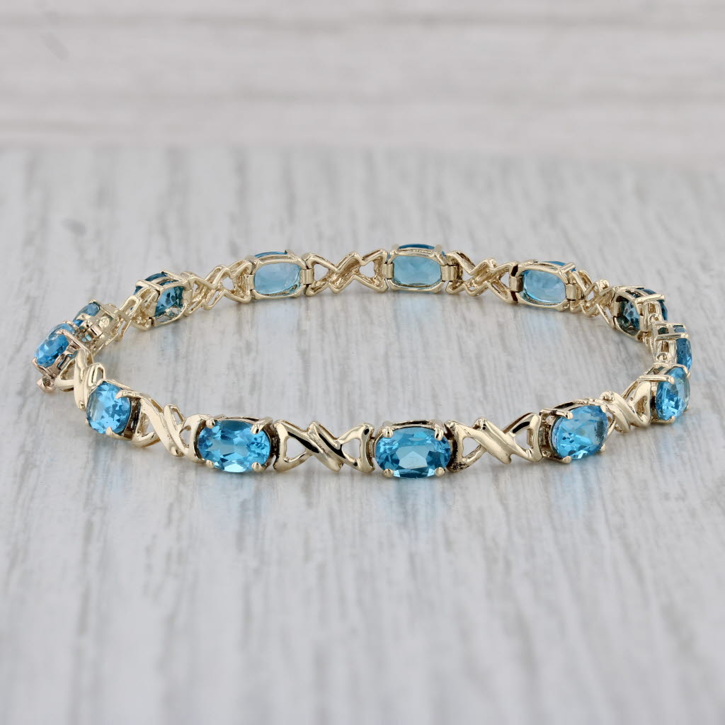 Gray 7.10ctw Blue Topaz Tennis Bracelet 10k Yellow Gold 6.75" 4.3mm