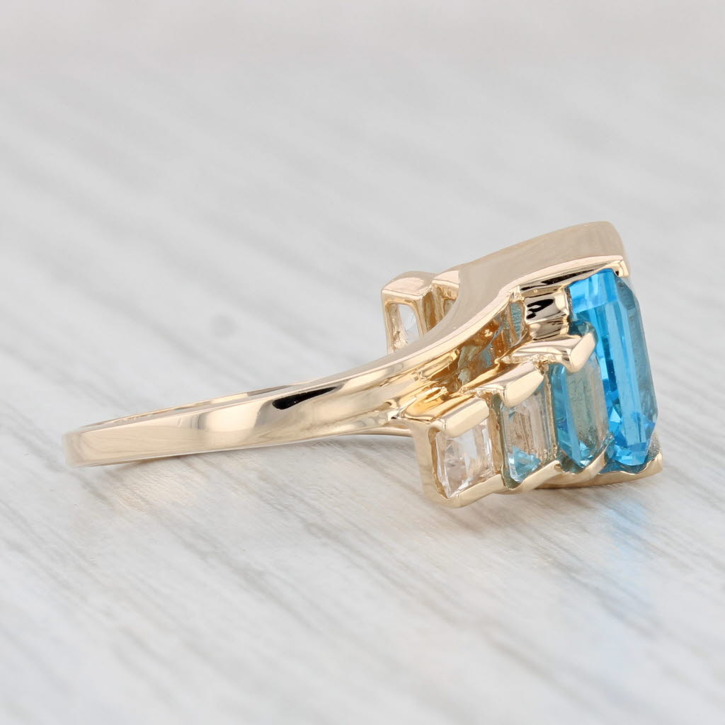 Light Gray 4.30ctw Blue White Tiered Topaz Ring 14k Yellow Gold Size 7