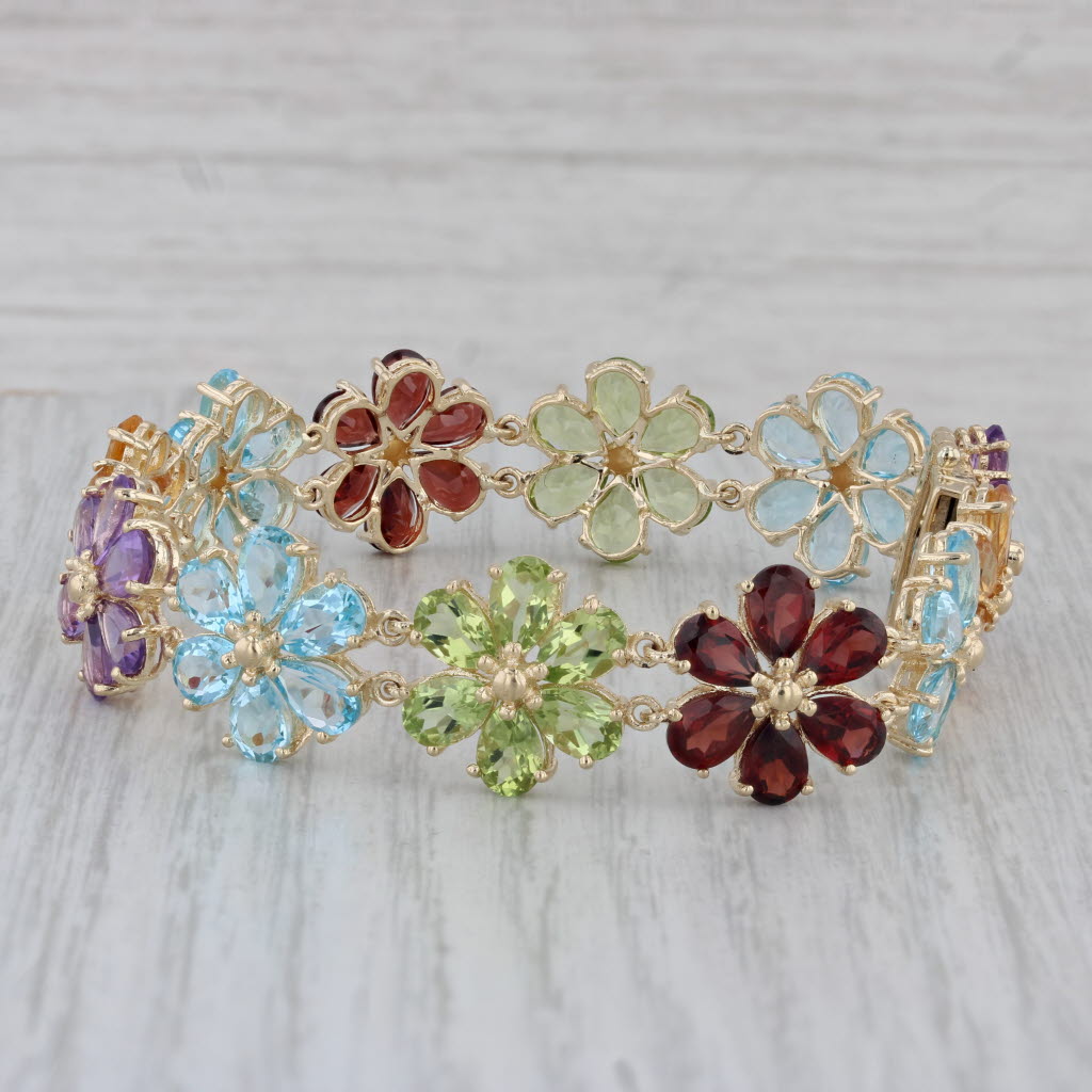 Gray 43.8ctw Gemstone Flower Bracelet 10k Gold 7" Garnet Topaz Peridot Amethyst