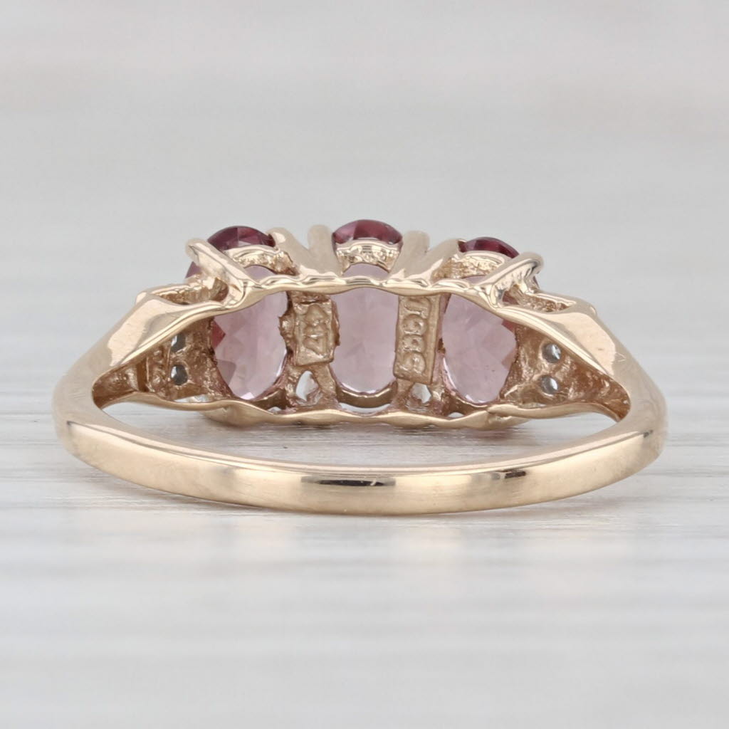 Light Gray 1.76ctw Color Change Garnet 3-Stone Ring 9k Yellow Gold Size 6.25 COA