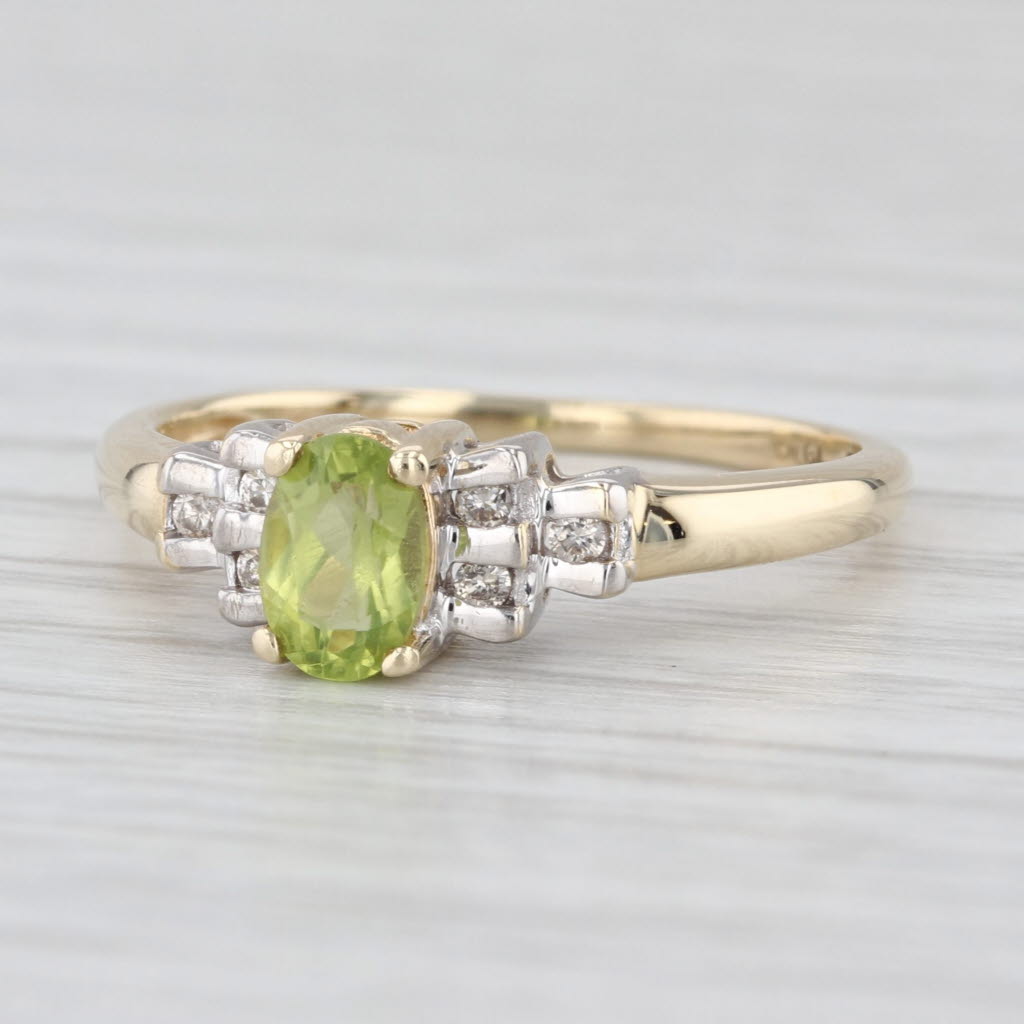 0.58ctw Oval Peridot Diamond Ring 10k Yellow Gold Size 7.25