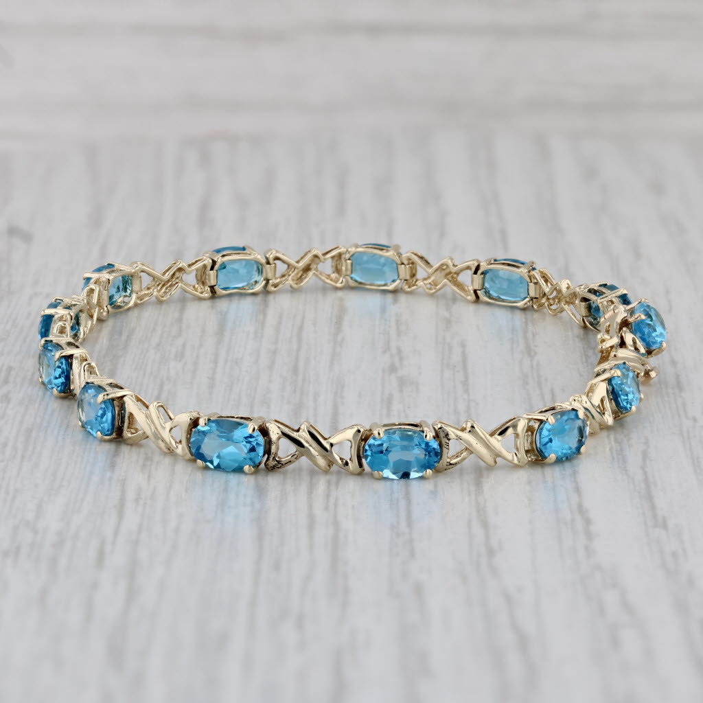 Gray 7.10ctw Blue Topaz Tennis Bracelet 10k Yellow Gold 6.75" 4.3mm