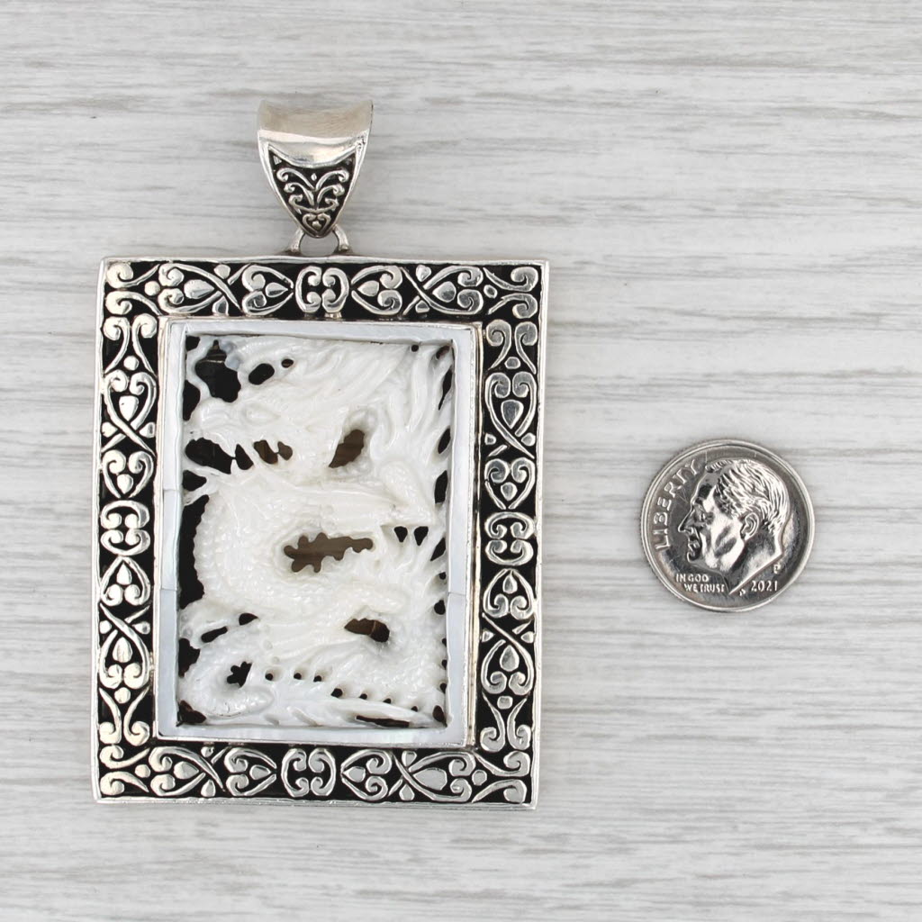 Milo Carved Mother of Pearl Dragon Ornate Frame Pendant Sterling Silver