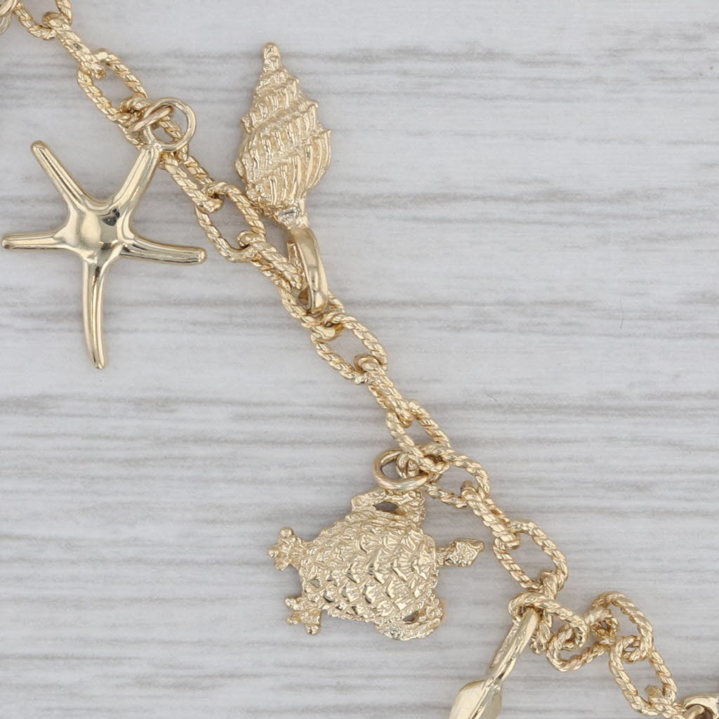 Gray Nautical Themed Charm Bracelet 10k 14k Yellow Gold 7.5" Shell Turtle Seahorse