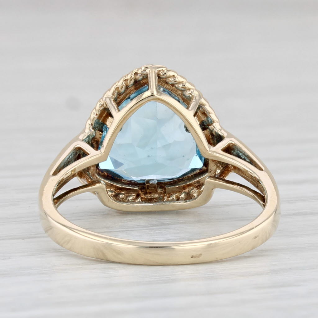 Light Gray 3.10ctw Trillion Blue Topaz Diamond Ring 10k Yellow Gold Size 6.75