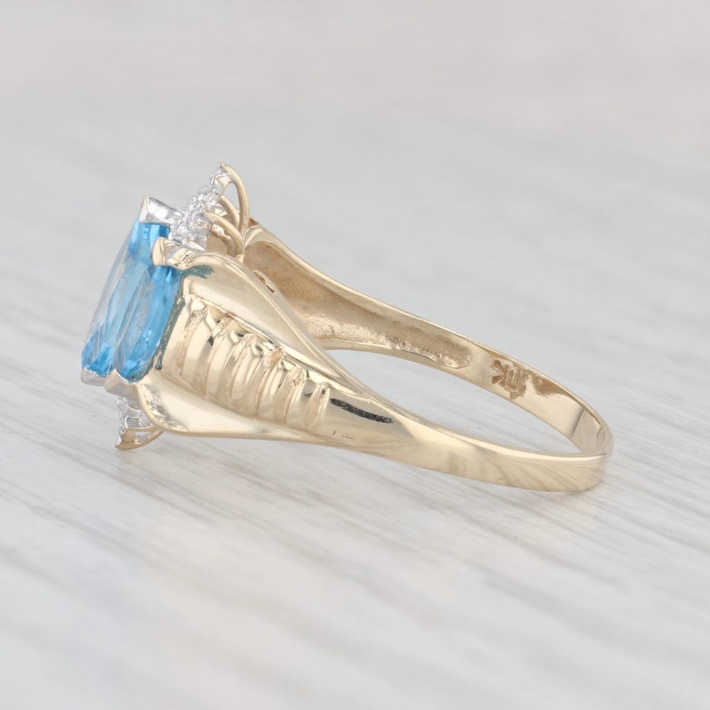 Light Gray 1.25ctw 3-Stone Blue Topaz Diamond Ring 10k Yellow Gold Size 7.25