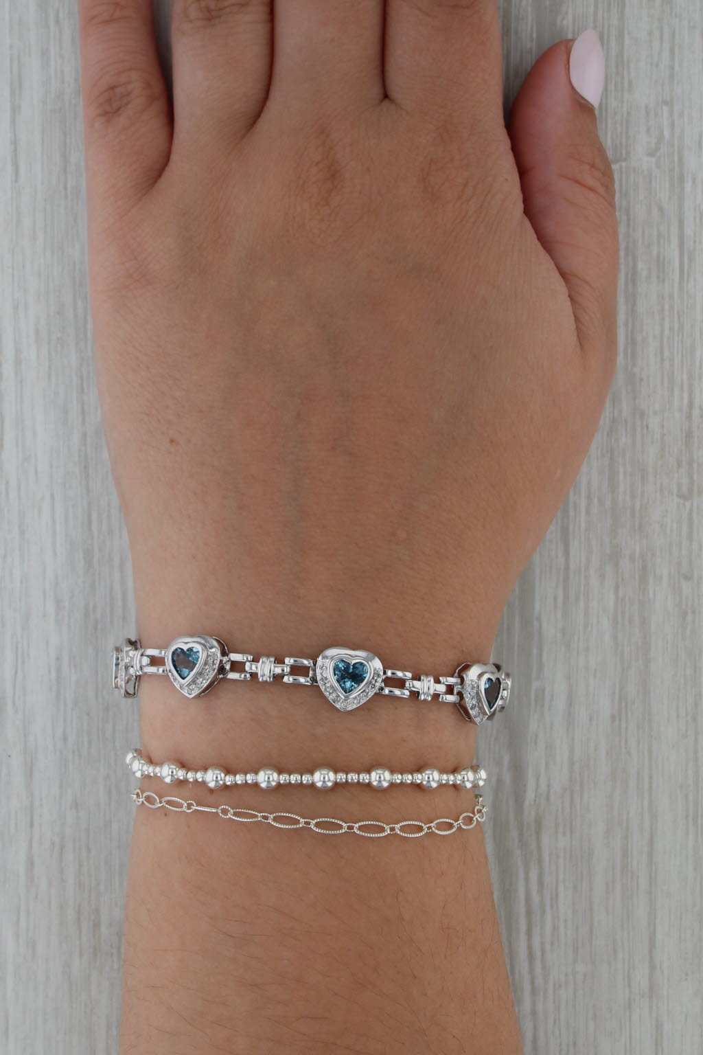 4.61ctw Blue Topaz Hearts Diamond Bracelet 14k White Gold 7"