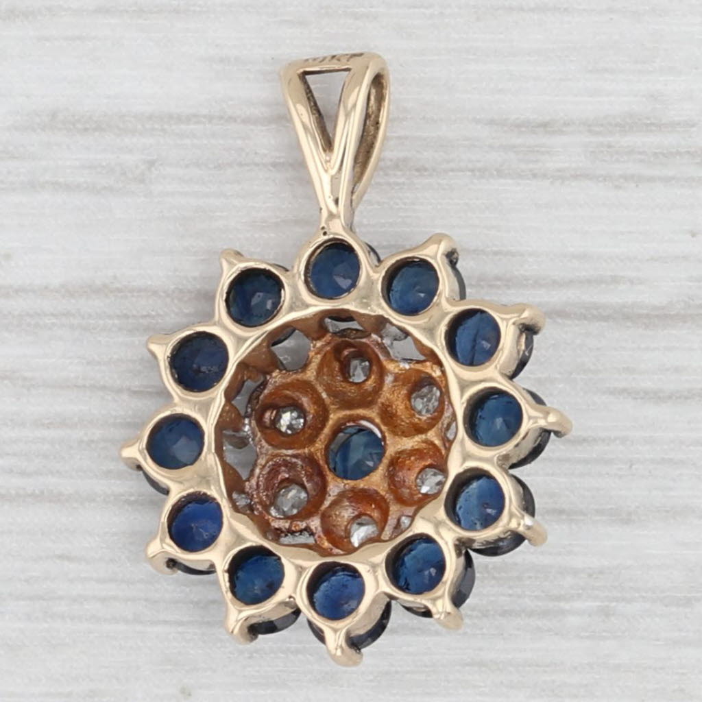 Light Gray 1.05ctw Blue Sapphire Diamond Flower Pendant 10k Yellow Gold