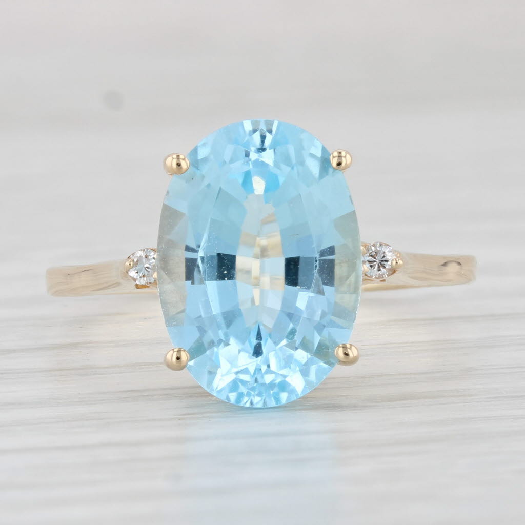 Light Gray 7.04ctw Oval Blue Topaz Diamond Ring 14k Yellow Gold Size 11.25