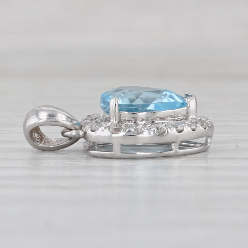 2.50ctw Blue Topaz Diamond Halo Heart Pendant 18k White Gold