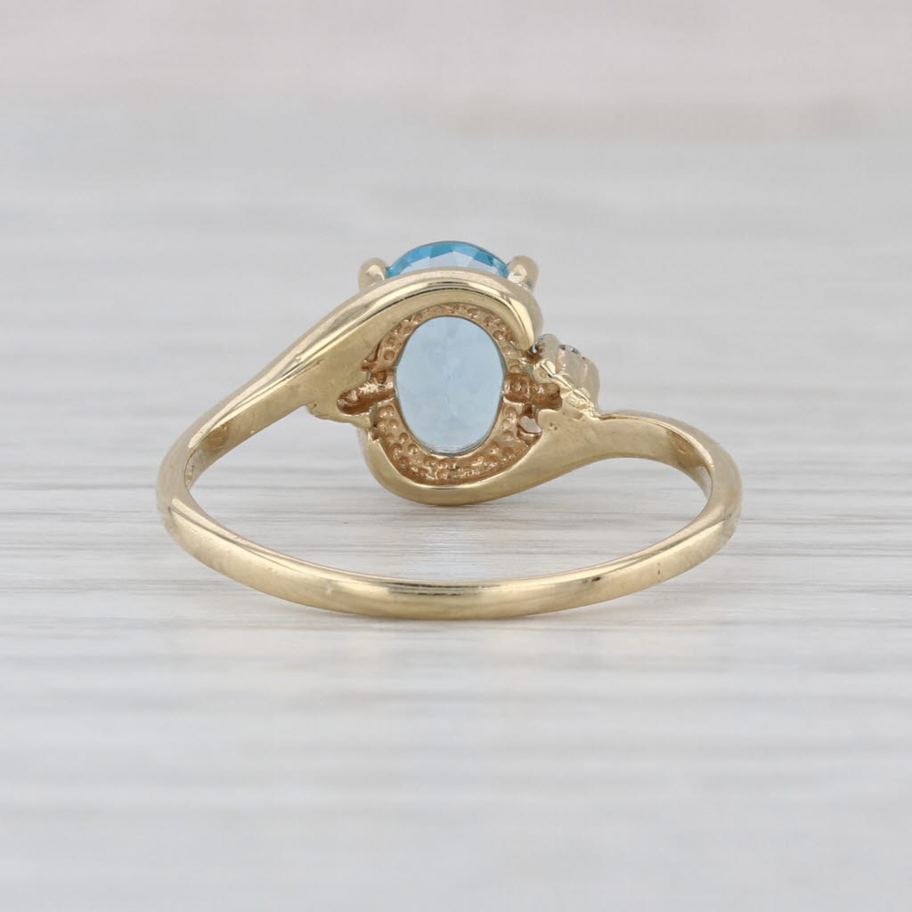 1.53ctw Oval Blue Topaz Diamond Bypass Ring 14k Yellow Gold Size 7.75