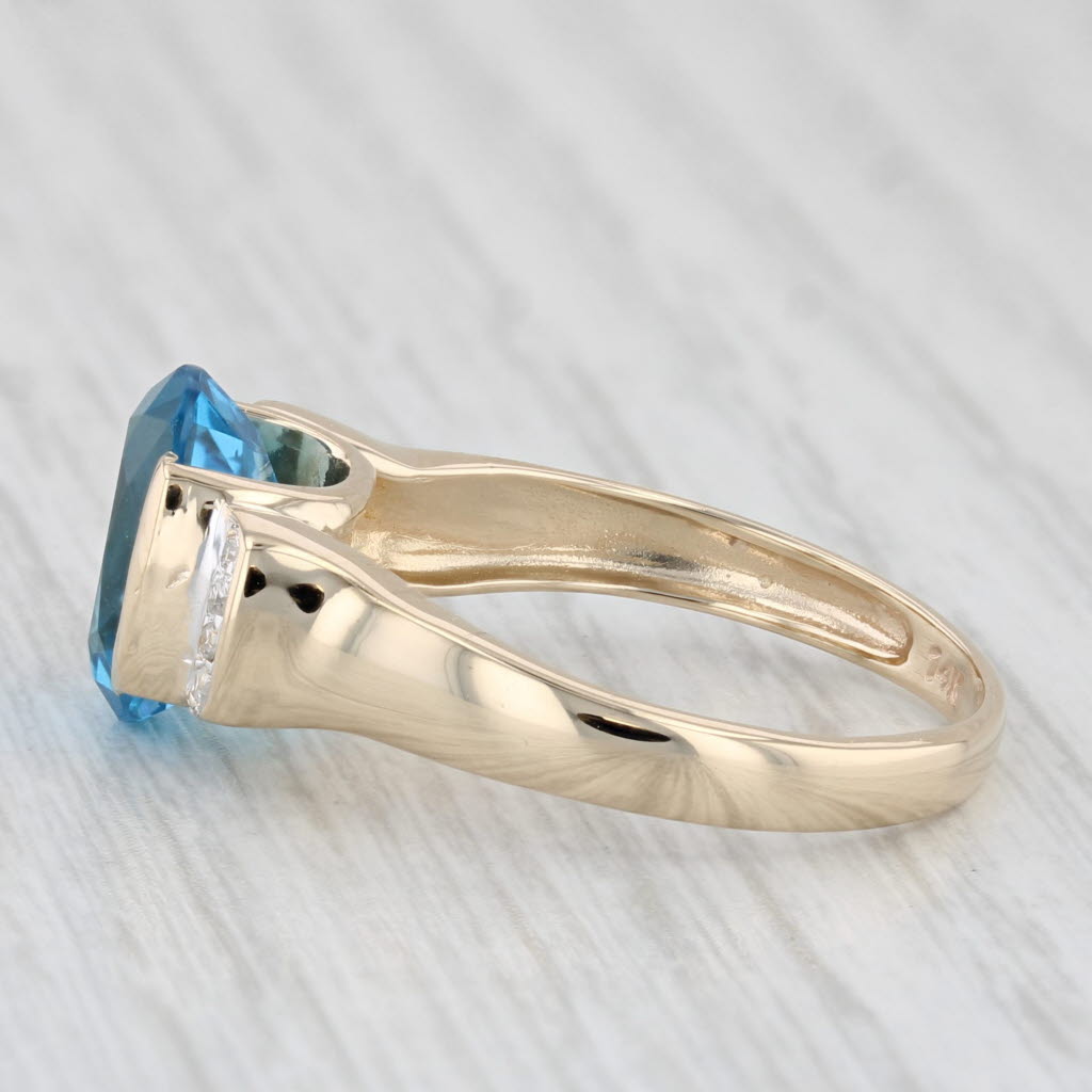 Light Gray 3.40ctw Oval Blue Topaz Diamond Ring 14k Yellow Gold Size 7.25