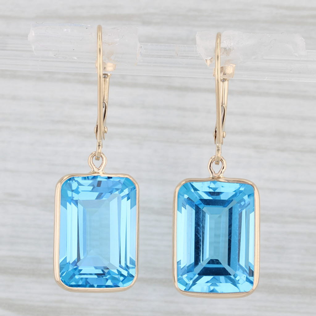 Light Gray 25ctw Blue Topaz Dangle Earrings 14k Yellow Gold Emerald Cut Drops