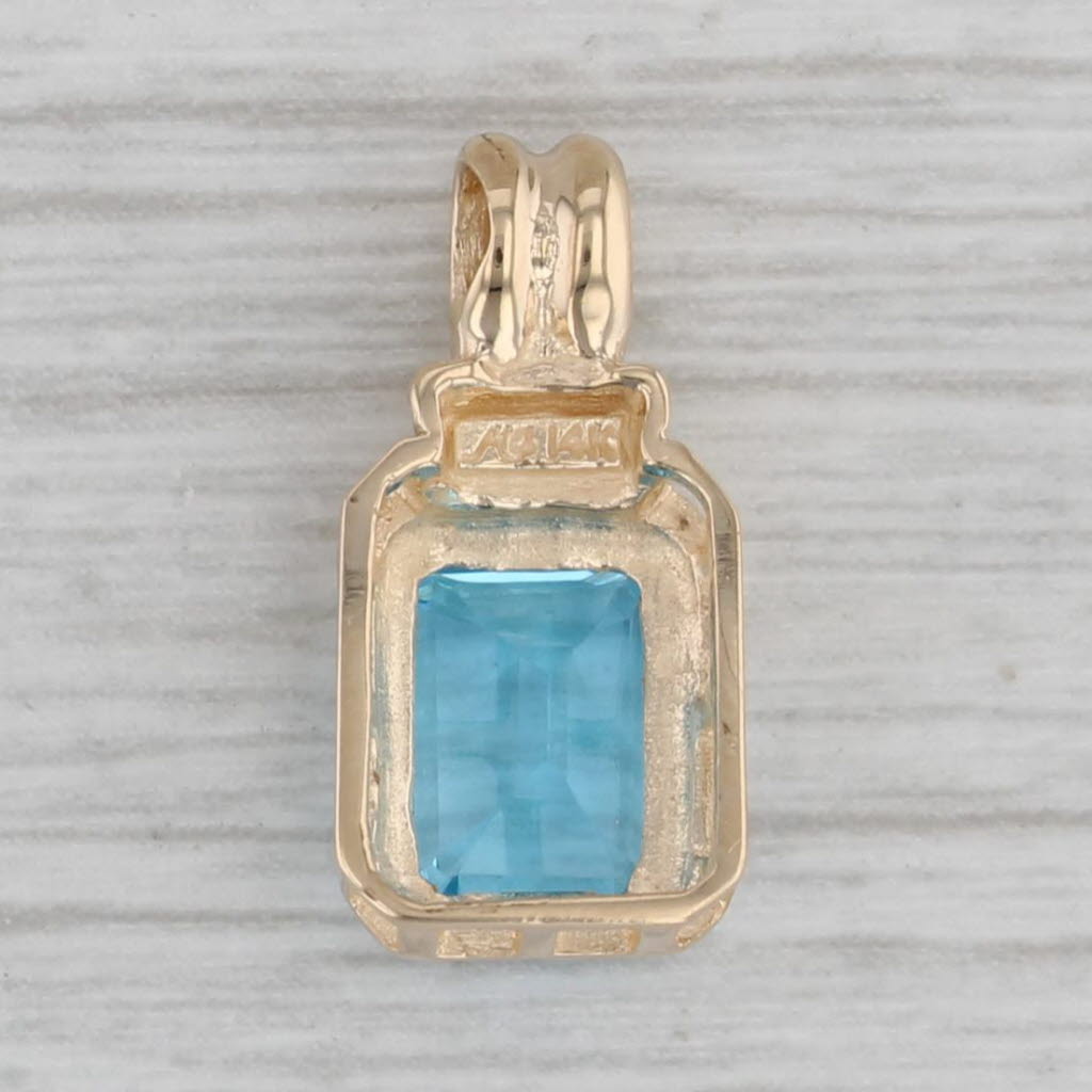 Gray 2.06ct Blue Topaz Solitaire Pendant 14k Yellow Gold Small Emerald Cut Drop