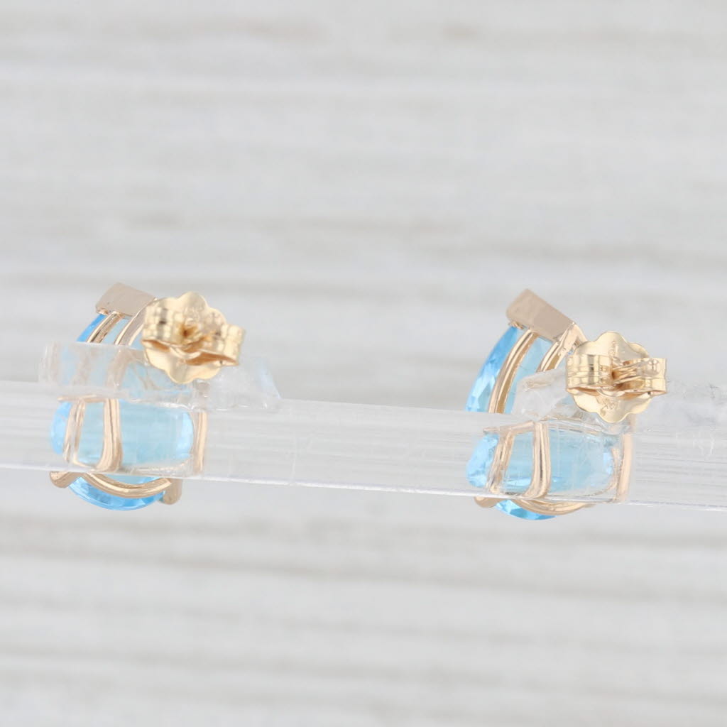 Light Gray 5ctw Pear Solitaire Blue Topaz Stud Earrings 14k Yellow Gold