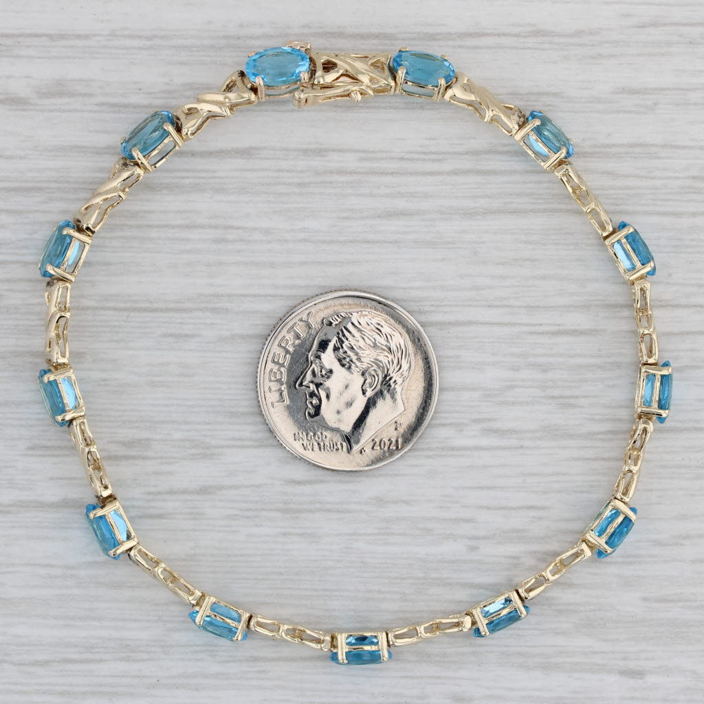 Gray 7.10ctw Blue Topaz Tennis Bracelet 10k Yellow Gold 6.75" 4.3mm