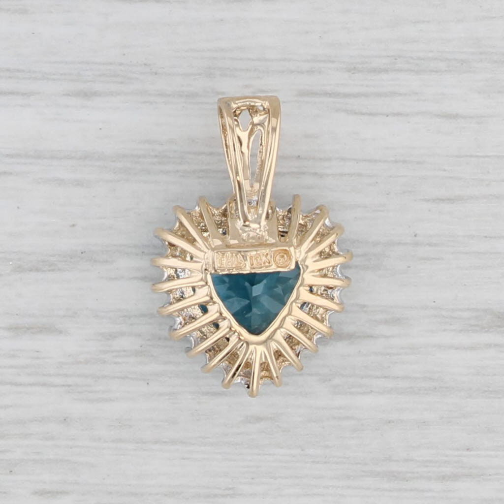 Light Gray 0.490ctw London Blue Topaz Heart Diamond Halo Pendant 10k Yellow Gold