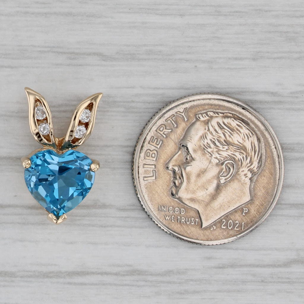 Gray 2.38ctw Blue Topaz Heart Diamond Pendant 14k Yellow Gold