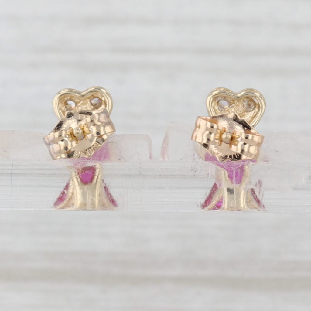 Light Gray 1.23ctw Lab Created Ruby Diamond Heart Stud Earrings 10k Yellow Gold