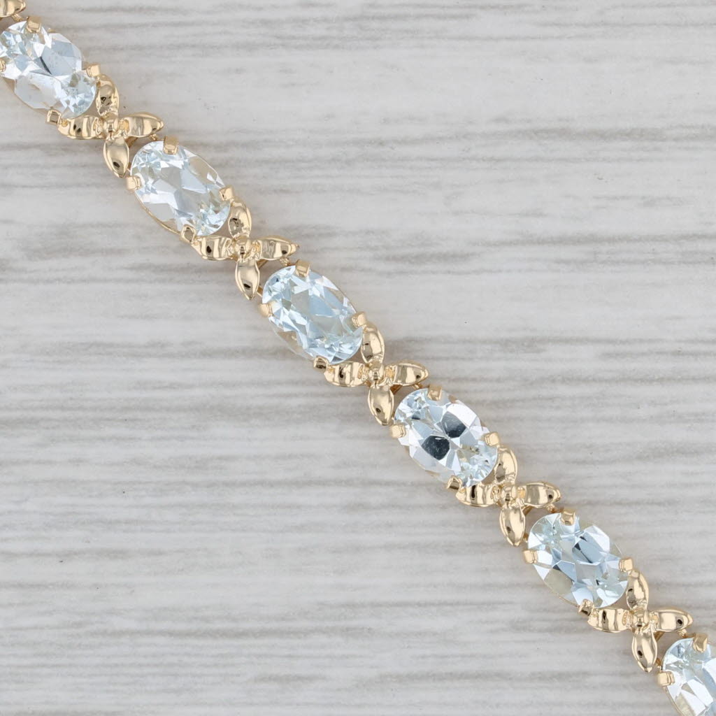 Gray 6.80ctw Oval Aquamarine Floral Tennis Bracelet 14k Yellow Gold 7" 4.2mm