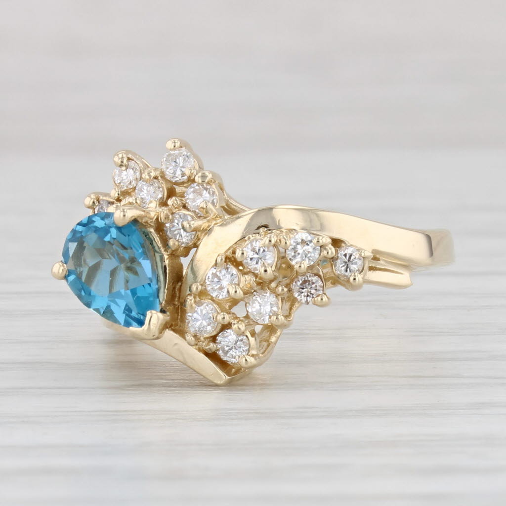 Light Gray 1.15ctw Pear Blue Topaz Diamond Ring 14k Yellow Gold Size 5.25
