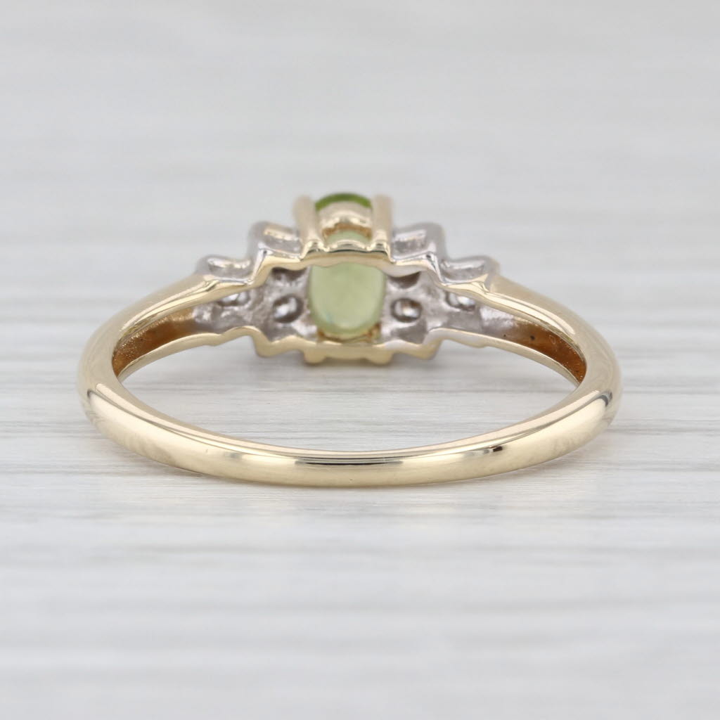 0.58ctw Oval Peridot Diamond Ring 10k Yellow Gold Size 7.25