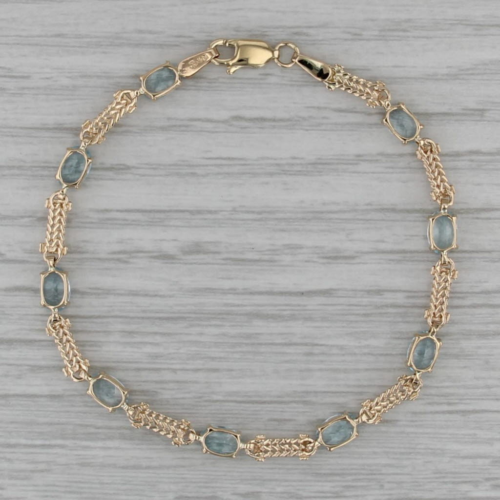 5.10ctw Blue Topaz Tennis Bracelet 10k Yellow Gold 7" 4.3mm