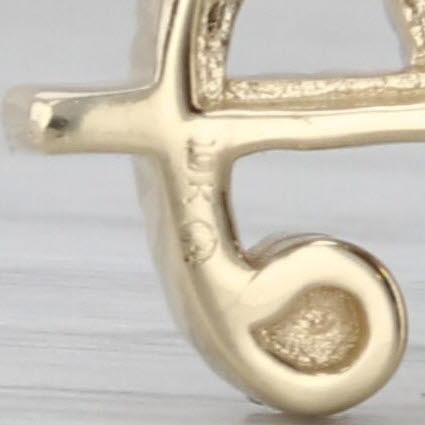 0.15ctw Diamond Dollar Sign Pendant 10k Yellow Gold $