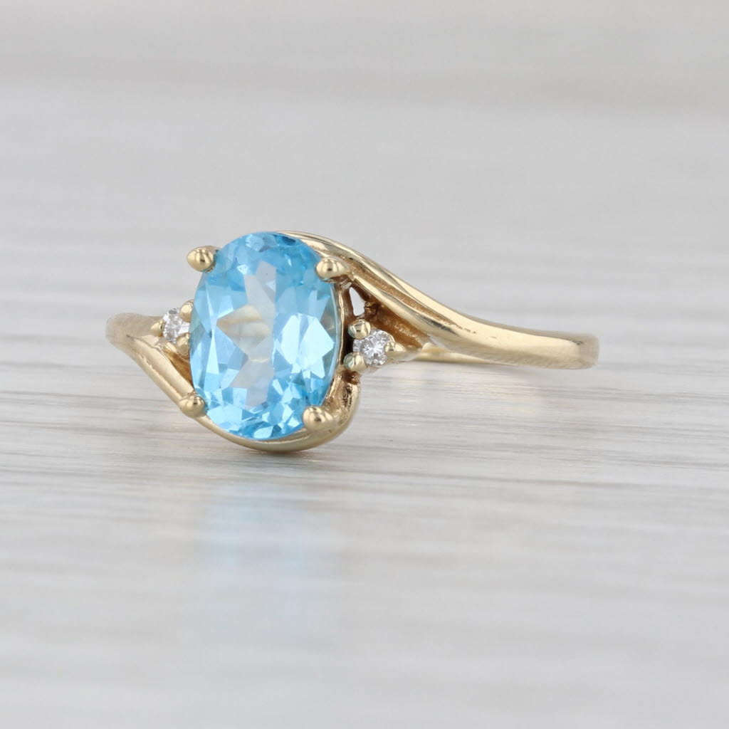 1.53ctw Oval Blue Topaz Diamond Bypass Ring 14k Yellow Gold Size 7.75
